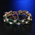 Luxury gold bracelet with green pear-shaped crystals and round AAA zircons in circular layout - 18cm / Rose Gold Green Zircon