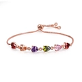 Dettaglio del bracciale regolabile in oro rosa con sei pietre di zircone colorate - Stile Goccia d'Acqua