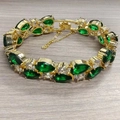 Rose gold bracelet featuring sparkling pear-cut emerald green zircons with secure clasp - 20cm / Gold Green Zirconia