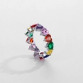 Close-up of heart-shaped multi-color zircon stones set in a silver ring band - US 6 / Rhodium Plated Rainbow