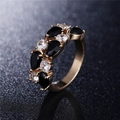 Bague élégante en or rose avec cristaux noirs en goutte et zircons scintillants - Or Zircone Noire