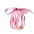 Set de cinco pulseras de silicona con purpurina rosa, lazo de satén y cierres dorados - Rosa