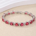Detailed view of vintage silver chain with red oval gemstones and crystal accents - Oval Halo Style (B00331) / Red
