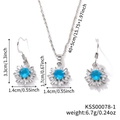 Sonnenblumen-Schmuckset aus Silber mit blauem Edelstein und Zirkonia-Ohrringen und Kette - Aquamarin