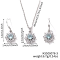 Silbernes Schneeflocken Schmuckset mit blauen Zirkonia Halskette und Ohrringen - See Blau