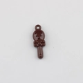 Macro detail of chocolate spoon pendant with glossy finish and cute bow for DIY jewelry - Brown