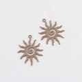Macro shot of two brown sun-shaped alloy charms with spiral texture for jewelry making - Khaki 40*33mm