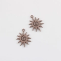Detail of two matte light brown sunflower alloy charms for DIY jewelry making and crafts - Khaki 24*19mm