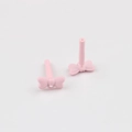 Detailed view of matte pink bow-shaped earring charms with pins for DIY jewelry making - Pink