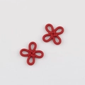 Detail shot of two red Chinese knot alloy pendants for DIY jewelry and crafts making - Red Coated