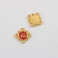 Detailed macro view of Chinese Fu character enamel charms with gold flower borders - Round Luck Knot Style / Matte Gold Good Fortune