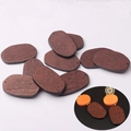 Oval walnut wood charms for DIY jewelry making with pre-drilled holes and natural grain - Walnut Oval Style