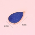 Blue agate stone teardrop pendant with gold metal trim measuring 23 by 37 mm - Blue Gold