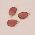 Three pieces of irregular pink natural agate pendants with gold plated metal edging - Deep Pink