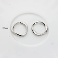 Detail view of 20mm irregular wave silver alloy circle pendant for DIY jewelry making - 20mm / Silver