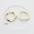 Detail view of 20mm irregular gold wavy alloy ring pendants for DIY earring jewelry making - 20mm / Gold