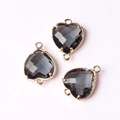 Three dark grey heart crystal charms with gold frames and dual loops for DIY jewelry - Smoke