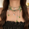 Detail of layered silver chain necklace with green butterfly charms and water-drop pendant - Silver Green Butterfly