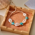 Handmade shell and starfish braided bracelet in turquoise blue and beige for beach vacations - Multi Shell Blue Starfish (4)