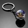 Luminous Libra zodiac double-sided glass ball keychain with silver metal ring and nebula background - Libra