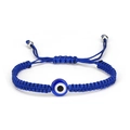 Navy blue braided evil eye bracelet with adjustable cord and resin bead detail - Eye Blue Rope