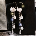 Elegant white floral tassel earrings with gold finish and sparkling crystal accents - White Flower Long Crystal