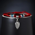 Red braided rope bracelet with blue evil eye beads and a silver owl charm pendant - Owl Style (BR18Y0738-4)
