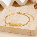 Golden Gemini zodiac charm bracelet featuring flat link chain and lobster clasp - Gold Gemini