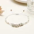 Adjustable woven bracelet with white natural stones, transparent beads, and gold accents - Textured White