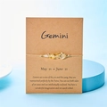 Bracciale Gemini in corda intrecciata con pietre di citrino su carta kraft espositiva - Gemelli