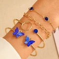 Five-piece gold daisy and blue butterfly bracelet set worn on model's wrist - Gold (7009)