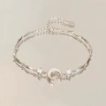 Pulsera plateada con dijes de luna y estrella con circonitas blancas brillantes - Estilo Luna