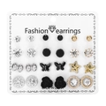 Set of 12 pairs of stud earrings featuring hearts, flowers, and stars on display card - Butterfly Star Rhinestone Style (ER21Y0531-1)