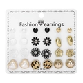 12-pair stud earring set featuring heart, flower, and leopard print designs on display card - Leopard Print Round Pearl Heart Style (ER21Y0531-3)