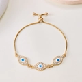 Verstellbares goldenes Armband mit drei blauen Augen und funkelnden Kristalldetails - Goldene Chopin-Kette-Drei Augen(BR23Y0936)