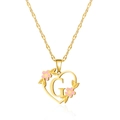 Collana a cuore in acciaio dorato con ciondolo lettera G e fiori in smalto rosa - Lettera G