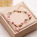 Handmade beaded anklet with pink starfish pendant, conch shells and golden chain detail - Pink Starfish (AK24Y0018-8)