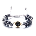Pulsera tejida a mano con piedras naturales moteadas negras y dije de druzy dorado - Negro