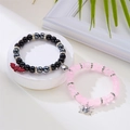 Bracciali magnetici per coppia con ciondoli a pipistrello e ragno su stand - Stile Nero E Rosa (Pipistrello Rosso E Ragno Argentato)