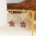 Elegante Kirschblüten-Ohrringe aus Gold mit lila Zirkonia-Blütenblättern für Damen - Ohrringe Lila