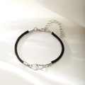 Minimalist black braided couple bracelet with interlocking silver hearts and lobster clasp - Black Rope With Silver Heart