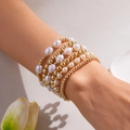 Stijlvolle meerlaagse armbandenset met imitatieparels en gouden kralen voor dames - 6-delige Stapelbare Parel Gouden Kraal Armband Collectie (BR24Y0393)
