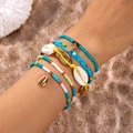 Bohemian multilayer bracelet set featuring pineapple shell charms and colorful seed beads - Style 2