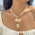Detail of beaded sea star necklace with shell pendants and gold conch shell charm - Star-Beaded Gold OT Clasp Ocean Style (NC25Y0356-5)