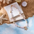 Seestern Halskette mit rosa Steinen und weißen Muscheln im böhmischen Strandstil - Halskette-Rosa