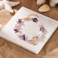 Böhmisches Armband mit lila Steinen, Seestern-Anhänger und natürlichen Muscheln - Armband-Lila