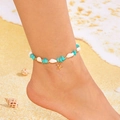 Boho-Fußkettchen mit blauen Steinen, Muscheln und goldenem Seestern am sonnigen Strand - Fußkettchen - Grün