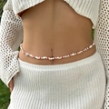 Bohemian waist chain with red beads and natural shell starfish pendants on a model - Red Style