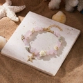 Boho-Strandarmband mit rosa Natursteinen, echten Muscheln und goldenem Seestern-Anhänger - Armband-Rosa
