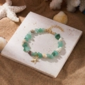 Boho Muschel Armband mit hellgrünem Kies und goldenem Seestern Anhänger für Damen - Armband-Grün